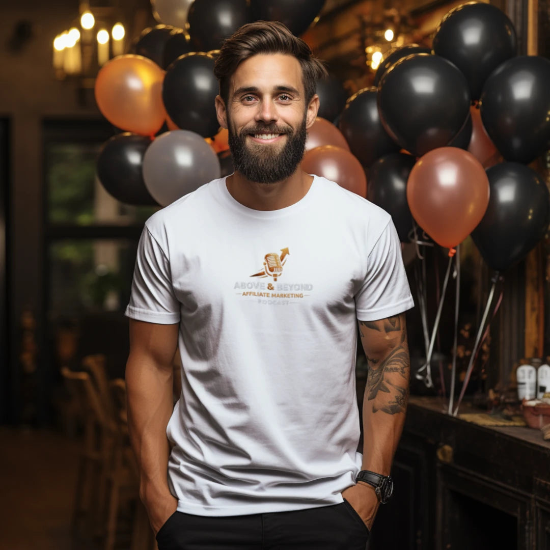 Man wearing a 'Above and Beyond Affiliate Marketing Podcast' t-shirt with balloons in the background